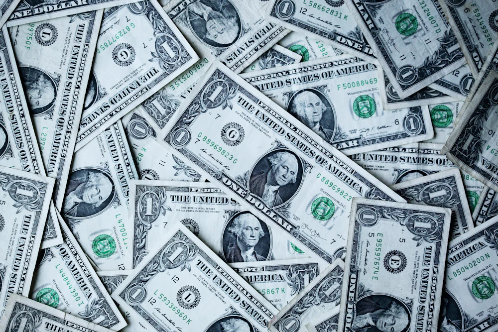 Tumpukan koin emas sebagai ilustrasi nilai bonus